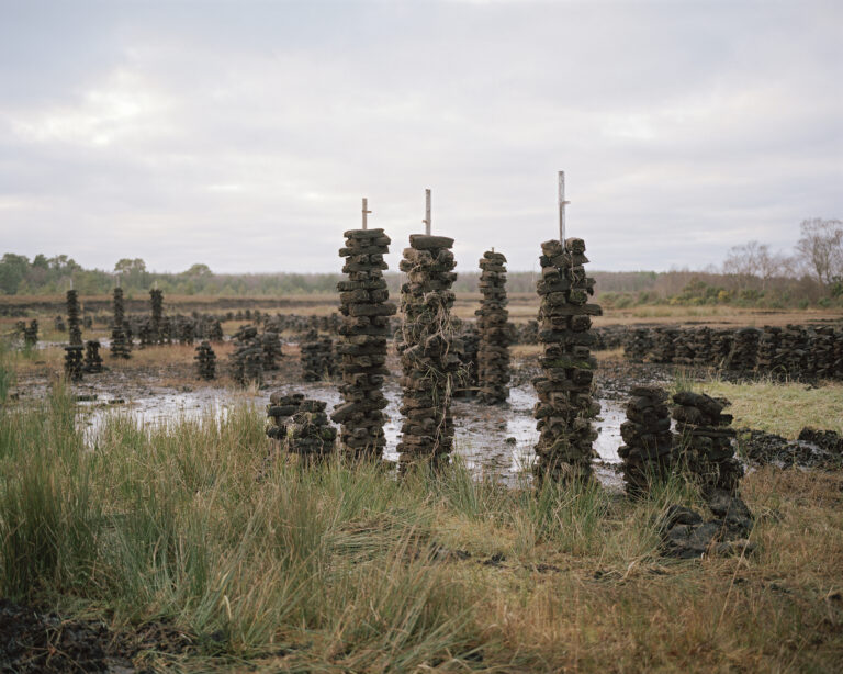 Tony’s footings in winter. An unconventional technique to stack turf due to an excessively wet bog. Community owned bog, Carbury, County Kildare, Ireland. Beneath | Beofhód, Volume 2, No. 27-07, 2019.:
"From the ongoing series ‘Beneath | Beofhód’. See series description for further information. 
Beofhód is an Irish word translating as 'life beneath the sod'.