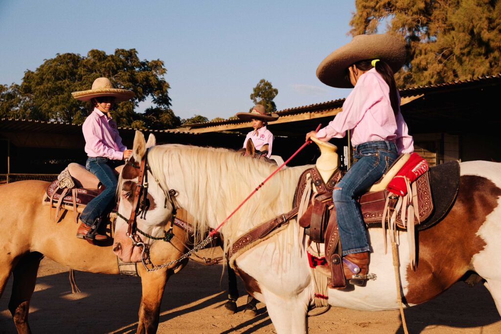 © Owen Harvey - Escaramuzas take a break during a rehearsal session for a competition in Mexico.